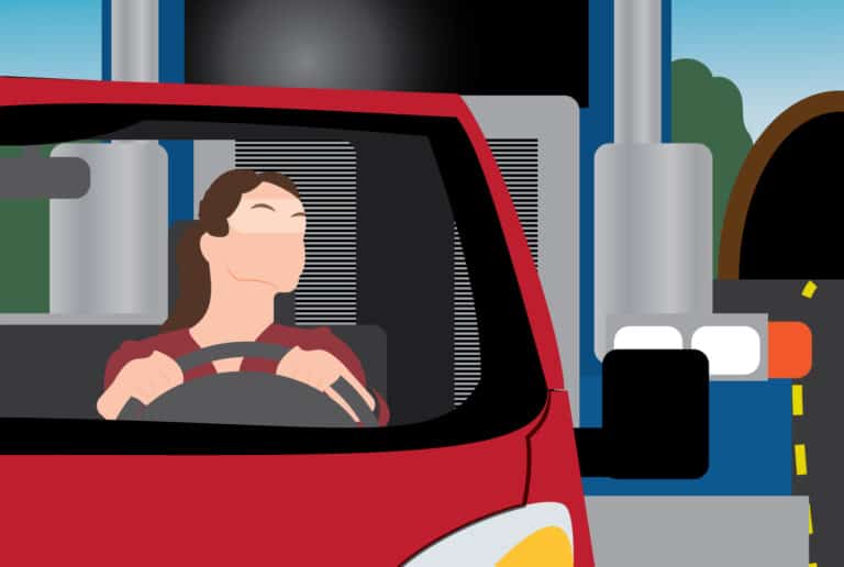 a woman driving a car