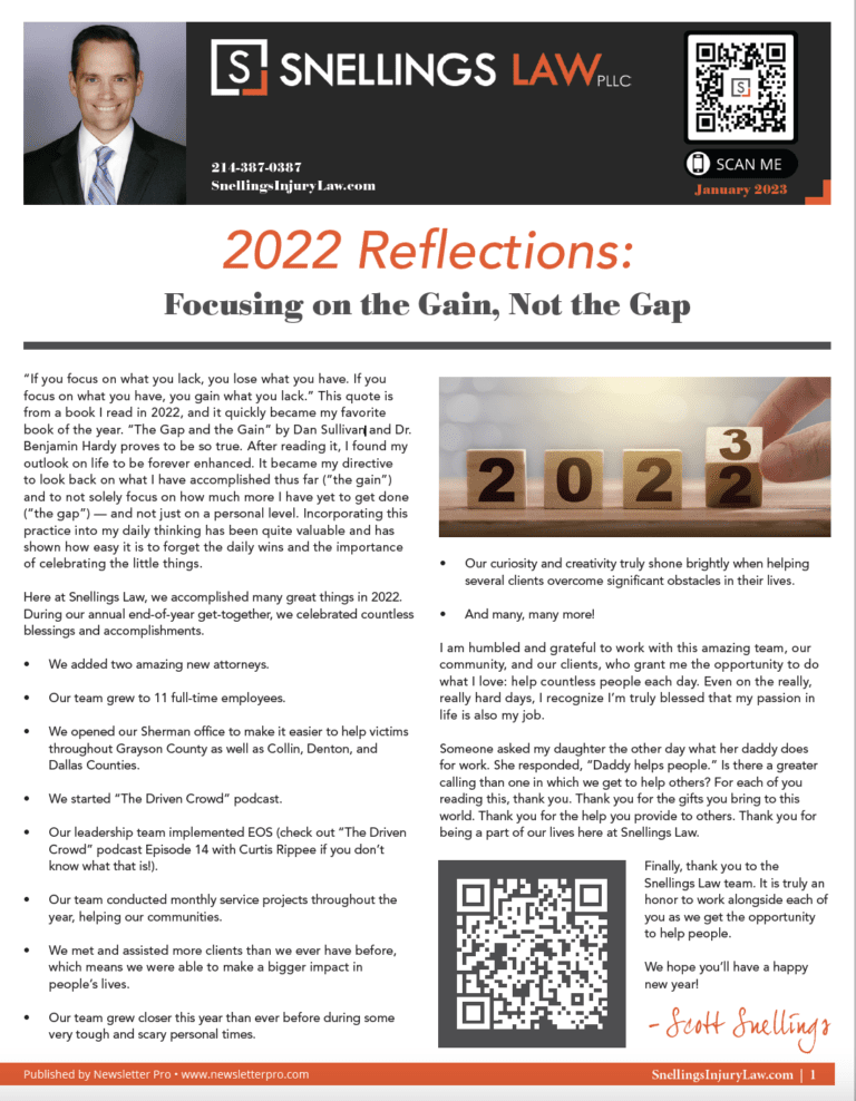 a man holding a wooden block