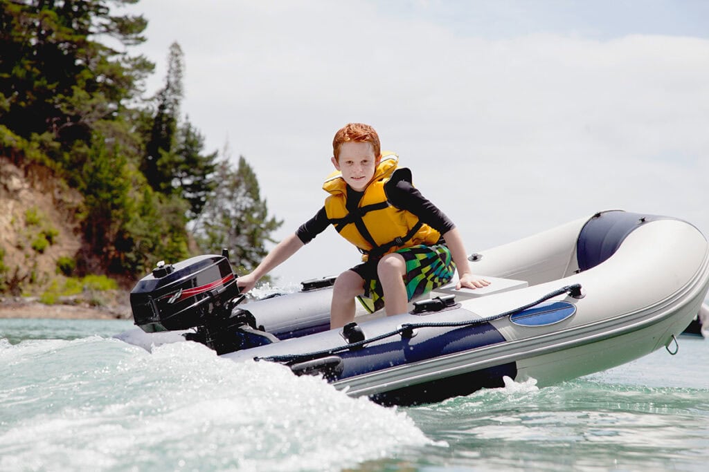 a boy in a boat