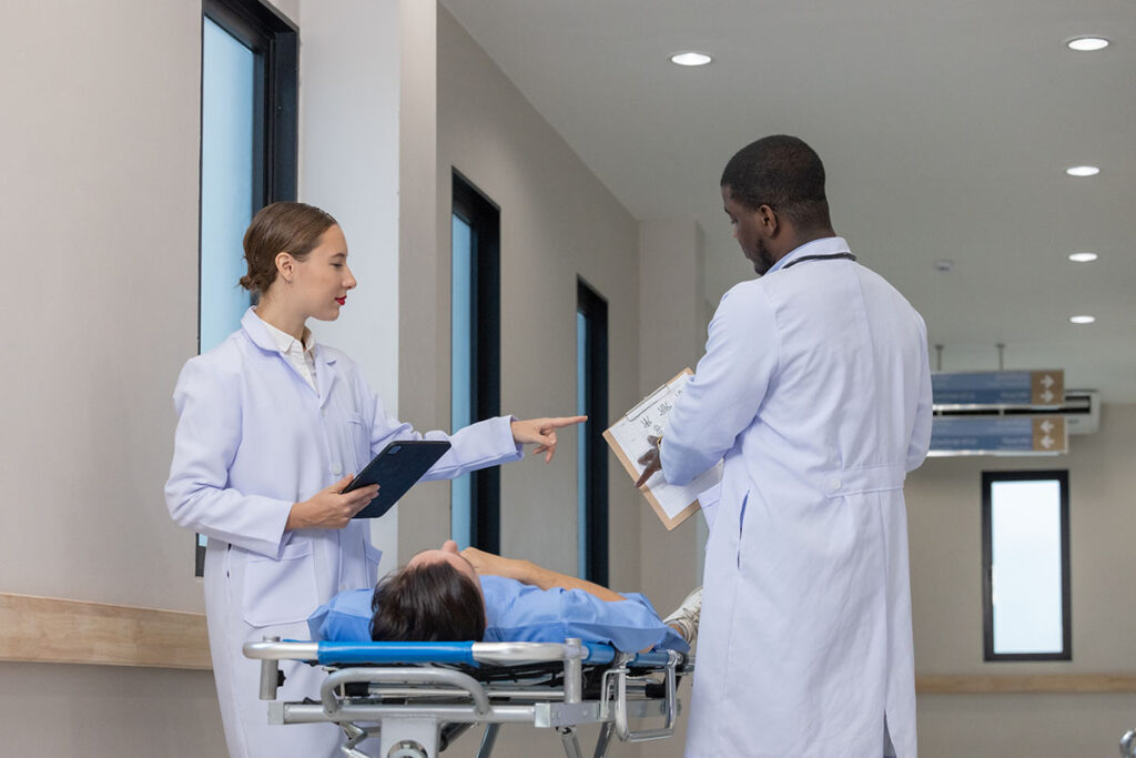 two doctors discussing patients medical history