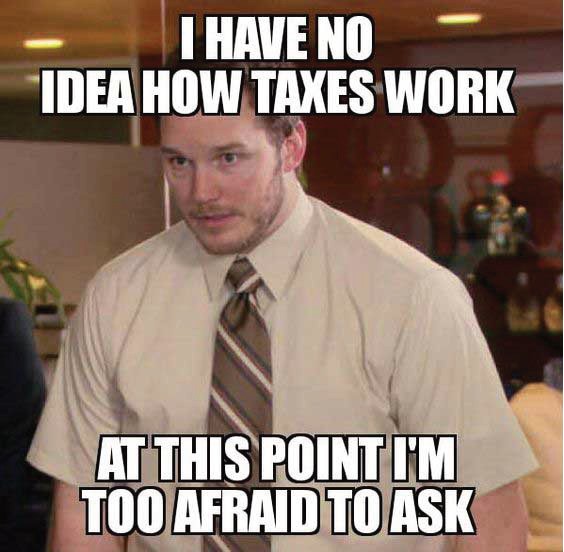 A meme of an office worker captioned I have no idea how taxes work, at this point I'm too afraid to ask